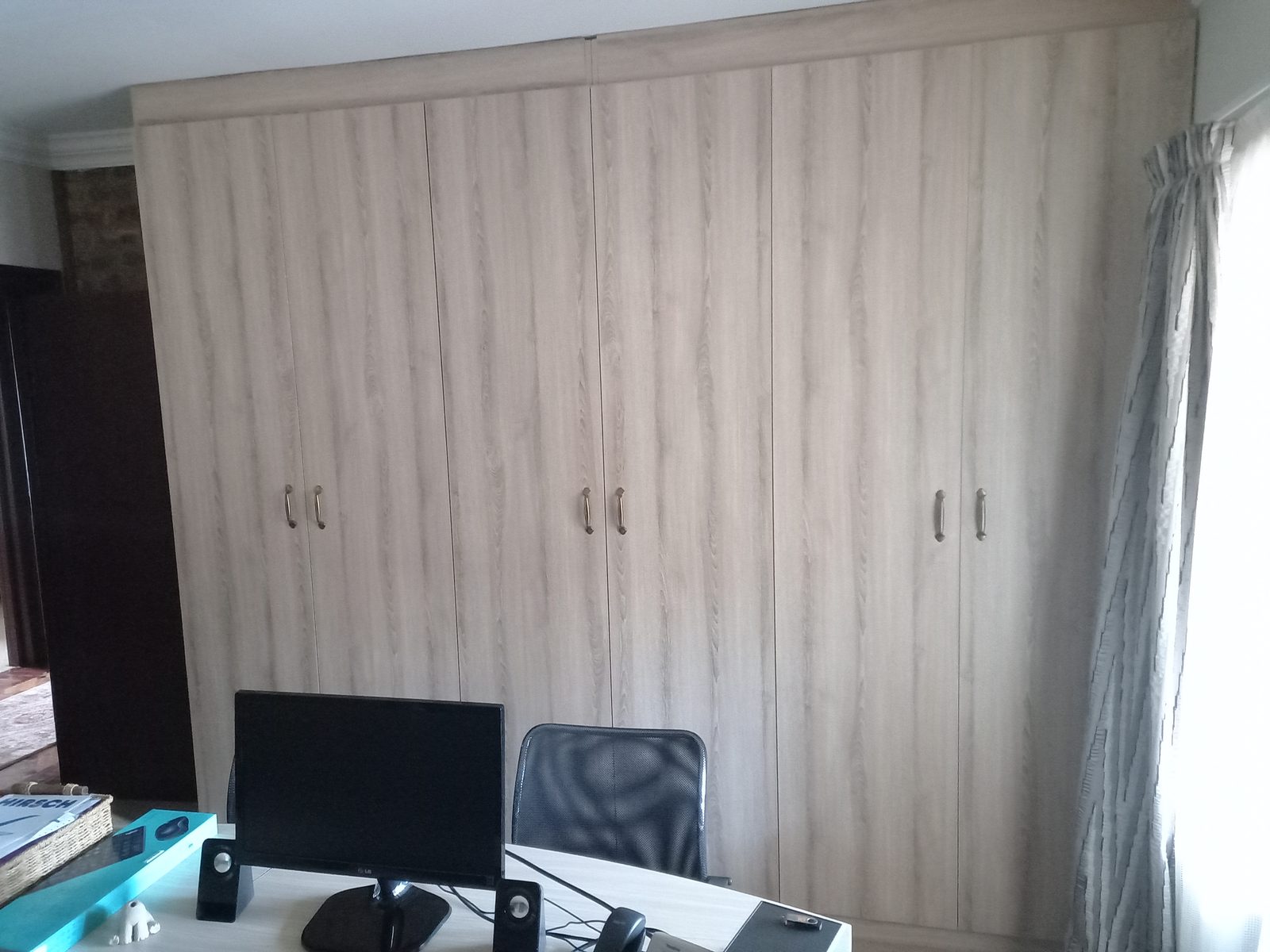 Floor-to-ceiling built-in cupboards in a Centurion bedroom