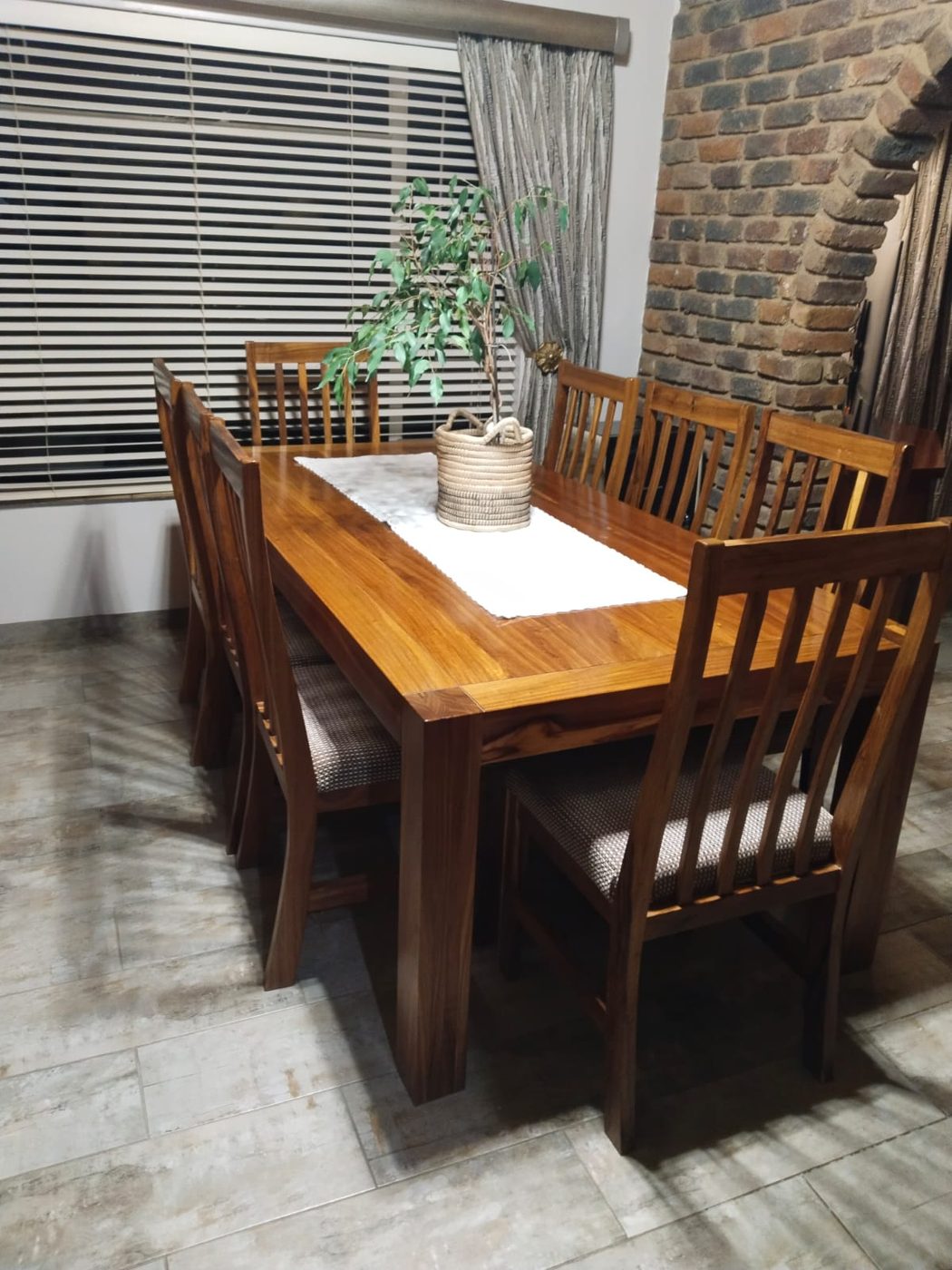 Custom solid-wood dining table and chairs